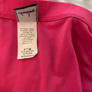 Pink jumpsuit, size M, used in good condition.